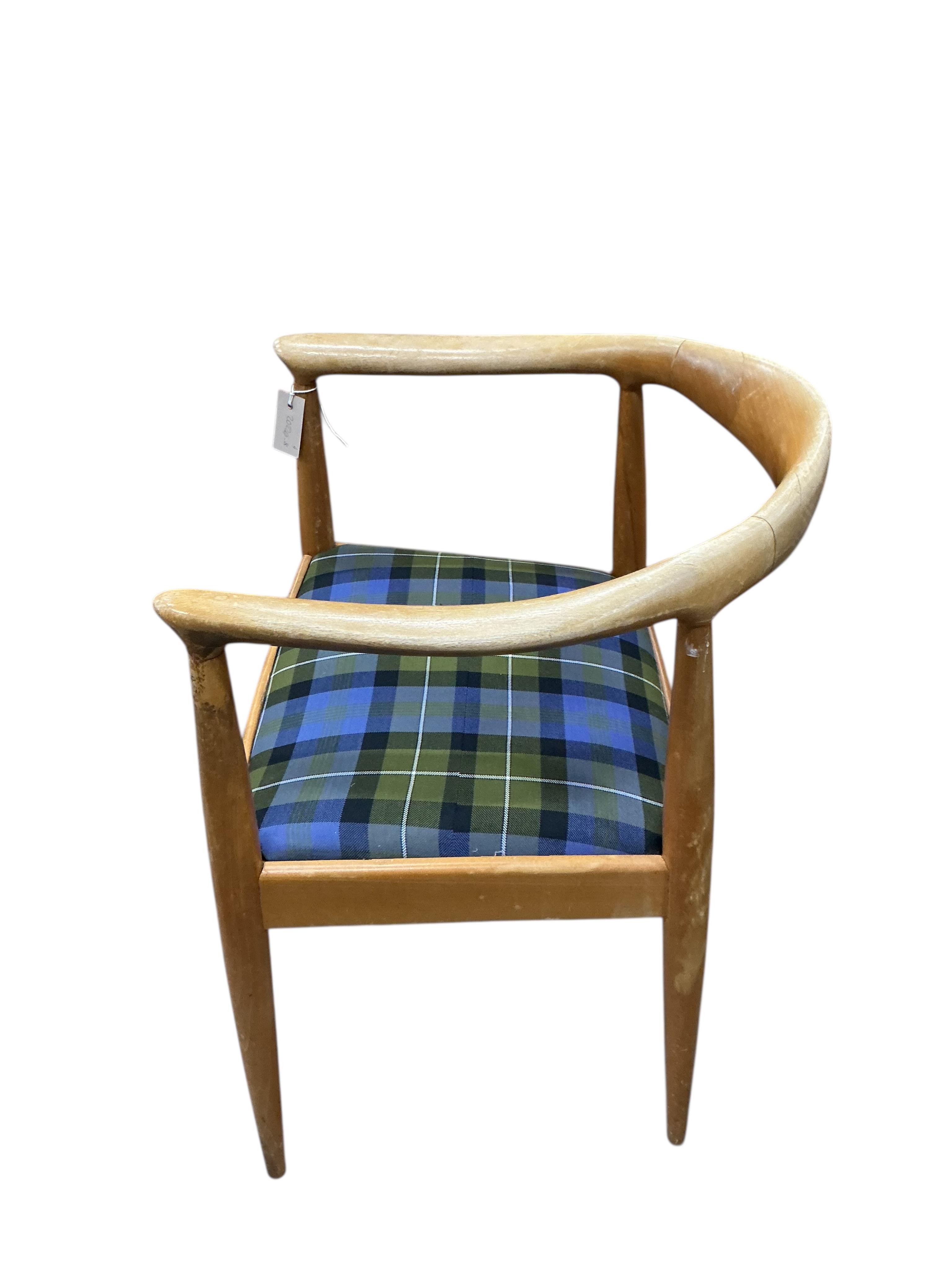 A set of four mid century teak Wegner design elbow chairs, width 59cm, depth 44cm, height 75cm